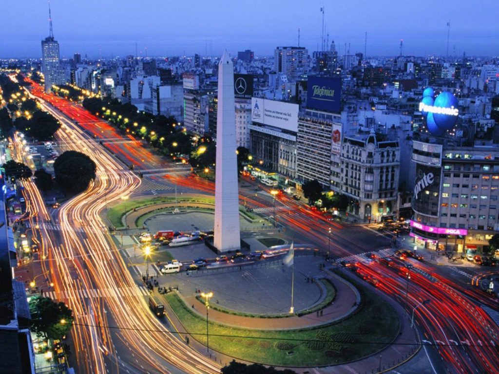 A city with many lights and buildings at night