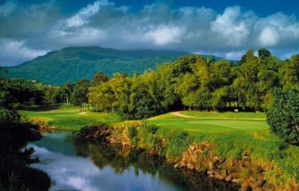 A view of the golf course from across the river.