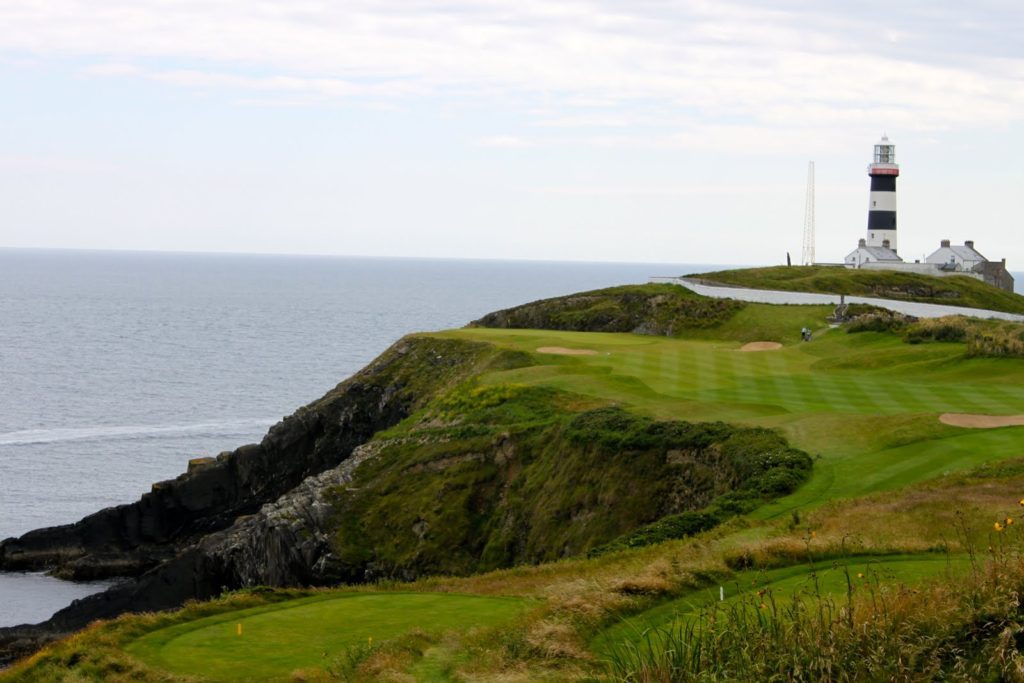 A view of the ocean from a golf course.