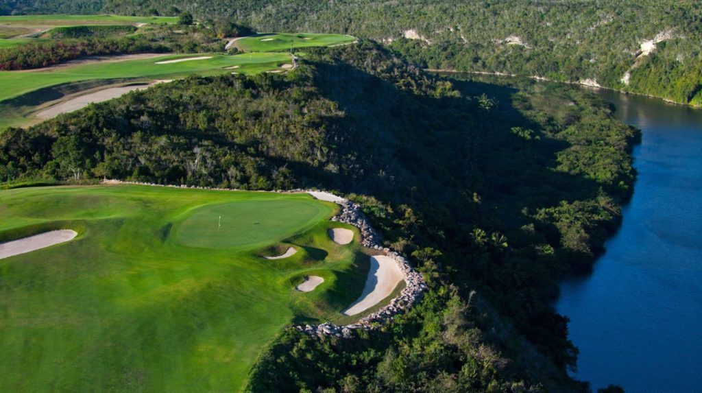 A golf course with many people on it