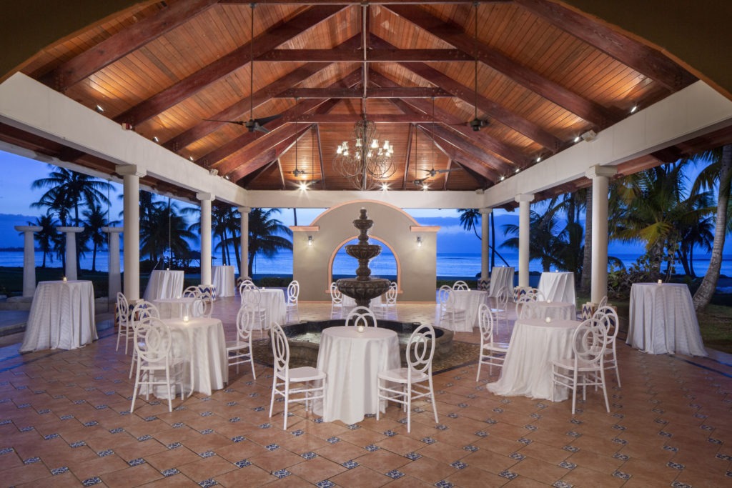 A room with tables and chairs in it